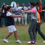 Rory McIlroy of Northern Ireland celebrates winning the British Open Golf championship with his mother Rosie after the final round at the Royal Liverpool golf club, Hoylake, England, Sunday July 20, 2014. (AP Photo/Scott Heppell)