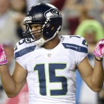 Seattle Seahawks wide receiver Jermaine Kearse (15) celebrates his touchdown during the first half of an NFL football game against the Washington Redskins in Landover, Md., Monday, Oct. 6, 2014. (AP Photo/Nick Wass)