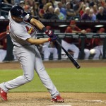 St. Louis Cardinals' Jhonny Peralta connects for a two-run double against the Arizona Diamondbacks during the sixth inning of a baseball game Friday, Sept. 26, 2014, in Phoenix. (AP Photo/Ross D. Franklin)