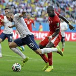  France's Karim Benzema is tripped by Switzerland's Johan Djourou during the group E World Cup soccer match between Switzerland and France at the Arena Fonte Nova in Salvador, Brazil, Friday, June 20, 2014. (AP Photo/Natacha Pisarenko)