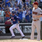Arizona Diamondbacks pitcher Patrick Corbin, right, reacts as New York Mets' Matt Harvey rounds the bases after hitting a two-run home run during the fifth inning of a baseball game against the Arizona Diamondbacks, Saturday, July 11, 2015, at Citi Field in New York. (AP Photo/Bill Kostroun)

