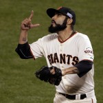 San Francisco Giants relief pitcher Sergio Romo celebrates the end of the top of the eighth inning of Game 4 of the National League baseball championship series against the St. Louis Cardinals Wednesday, Oct. 15, 2014, in San Francisco.(AP Photo/Marcio Jose Sanchez)