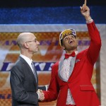 D'Angelo Russell, right, gestures upward as he is greeted by NBA Commissioner Adam Silver after the Los Angeles Lakers selected Russell with the second pick in the NBA basketball draft, Thursday, June 25, 2015, in New York. (AP Photo/Kathy Willens)