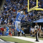 Detroit Lions wide receiver Corey Fuller (10) catches the game tying touchdown during the second half of an NFL football game against the New Orleans Saints in Detroit, Sunday, Oct. 19, 2014. (AP Photo/Paul Sancya)