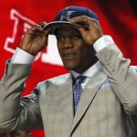 Nebraska defensive lineman Randy Gregory celebrates after being selected by the Dallas Cowboys as the 60th pick in the second round of the 2015 NFL Football Draft, Friday, May 1, 2015, in Chicago. (AP Photo/Charles Rex Arbogast)
