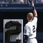  New York Yankees captain Derek Jeter (2) waves to fans during a pregame ceremony honoring the Yankees captain, who is retiring at the end of the season, on Derek Jeter Day at Yankee Stadium in New York, Sunday, Sept. 7, 2014. game (AP Photo/Kathy Willens)