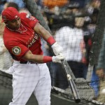 Outfielder Yoenis Cespedes, of the Oakland Athletics, hits during batting practice for the MLB All-Star baseball game, Monday, July 14, 2014, in Minneapolis. (AP Photo/Jeff Roberson)