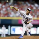 National League's Zack Greinke, of the Los Angeles Dodgers, throws during the first inning of the MLB All-Star baseball game, Tuesday, July 14, 2015, in Cincinnati. (AP Photo/Jeff Roberson)
