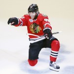 Chicago Blackhawks' Patrick Kane celebrates after scoring during the third period in Game 6 of the NHL hockey Stanley Cup Final series against the Tampa Bay Lightning on Monday, June 15, 2015, in Chicago. (AP Photo/Charles Rex Arbogast)
