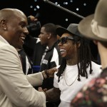 Tyrese, left, greets rapper Lil Wayne before the start of the WBC-WBA welterweight title boxing fight between Floyd Mayweather Jr. and Marcos Maidana Saturday, May 3, 2014, in Las Vegas. (AP Photo/Isaac Brekken)