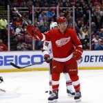 Detroit Red Wings right wing Luke Glendening (41) celebrates his goal against the Arizona Coyotes during the second period of an NHL hockey game in Detroit Tuesday, March 24, 2015. (AP Photo/Paul Sancya)