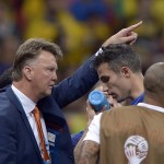 Netherlands' head coach Louis van Gaal gestures to Robin van Persie during the World Cup third-place soccer match between Brazil and the Netherlands at the Estadio Nacional in Brasilia, Brazil, Saturday, July 12, 2014. (AP Photo/Manu Fernandez)