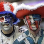 New England Patriot fans pose for a picture before the NFL Super Bowl XLIX football game against the Seattle Seahawks Sunday, Feb. 1, 2015, in Glendale, Ariz. (AP Photo/Patrick Semansky)