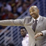 New Orleans Pelicans head coach Monty Williams calls out from the bench in the first half of an NBA basketball game against the Phoenix Suns in New Orleans, Friday, April 10, 2015. (AP Photo/Gerald Herbert)
