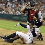 Houston Astros Jose Altuve goes down in pain past Arizona Diamondbacks catcher Miguel Montero after being hit by a pitch from Randall Delgado during the seventh inning of a baseball game, Thursday, June 12, 2014, in Houston. Altuve was taken out of the game. (AP Photo/Patric Schneider)
