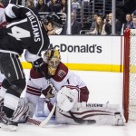  Phoenix Coyotes goalie Thomas Greiss (1) of Germany, makes a save shot by Los Angeles Kings forward Justin Williams (14) during the second period of an NHL hockey game, Wednesday, April 2, 2014, in Los Angeles. (AP Photo/Ringo H.W. Chiu)