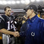 New England Patriots quarterback Tom Brady, left, shakes hands with Indianapolis Colts head coach Chuck Pagano after the NFL football AFC Championship game Sunday, Jan. 18, 2015, in Foxborough, Mass. The Patriots defeated the Colts 45-7 to advance to the Super Bowl against the Seattle Seahawks. (AP Photo/Julio Cortez)