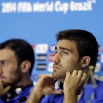 Greece's Sokratis Papastathopoulos, right, and Vasileios Torodosidis listen to reporter's questions during a press conference of Greece in Natal, Brazil, Wednesday, June 18, 2014. Greece play in group C of the 2014 soccer World Cup. (AP Photo/Shuji Kajiyama)