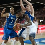United States's Kenneth Faried, center, duels for the ball beside Finland's Erik Murphy, right, and Shawn Huff,during the Group C Basketball World Cup match between United States and Finland, in Bilbao northern Spain, Saturday, Aug. 30, 2014. The 2014 Basketball World Cup competition will take place in various cities in Spain from Aug. 30 through to Sept. 14. (AP Photo/Alvaro Barrientos)