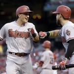 Arizona Diamondbacks' Nick Ahmed, left, is congratulated by teammate Ender Inciarte after hitting a solo home run during the second inning of a baseball game against the St. Louis Cardinals Tuesday, May 26, 2015, in St. Louis. (AP Photo/Jeff Roberson)