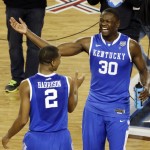 After Kentucky guard Aaron Harrison (2) made a three-point basket in the final seconds against Wisconsin to win the game 74-73, he celebrates with Julius Randle (30) at the end of their NCAA Final Four tournament college basketball semifinal game Saturday, April 5, 2014, in Arlington, Texas. (AP Photo/Tony Gutierrez)