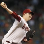 Arizona Diamondbacks' Trevor Cahill throws a pitch against the St. Louis Cardinals during the first inning of a baseball game Friday, Sept. 26, 2014, in Phoenix. (AP Photo/Ross D. Franklin)