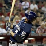  Milwaukee Brewers' Ryan Braun gets hit by a pitch thrown by Arizona Diamondbacks' Evan Marshall during the seventh inning of a baseball game on Tuesday, June 17, 2014, in Phoenix. Marshall was ejected from the game for the throw. (AP Photo/Ross D. Franklin)