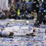 Connecticut center Amida Brimah celebrates after winning the NCAA Final Four tournament college basketball championship game 60-54, against Kentucky Monday, April 7, 2014, in Arlington, Texas. (AP Photo/Charlie Neibergall)