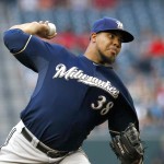 Milwaukee Brewers' Wily Peralta throws a pitch against the Arizona Diamondbacks during the first inning of a baseball game on Monday, June 16, 2014, in Phoenix. (AP Photo/Ross D. Franklin)