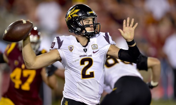 Arizona State quarterback Mike Bercovici looks for a receiver during the second half of an NCAA col...