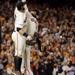 San Francisco Giants' Brandon Belt and Pablo Sandoval celebrate after Game 5 of baseball's World Series against the Kansas City Royals Sunday, Oct. 26, 2014, in San Francisco. The Giants won 5-0 to take a 3-2 lead in the series. (AP Photo/David J. Phillip)