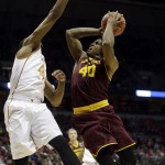  Texas center Prince Ibeh (44) tries to block a shot by Arizona State guard Shaquielle McKissic (40) during the first half of a second round NCAA college basketball tournament game Thursday, March 20, 2014, in Milwaukee. (AP Photo/Morry Gash)