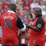 Ken Griffey Jr. shakes hands with his dad, Ken Griffey, before the start of the MLB All-Star baseball Home Run Derby, Monday, July 13, 2015, in Cincinnati. (AP Photo/John Minchillo)