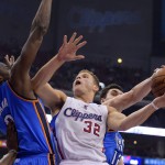  Los Angeles Clippers forward Blake Griffin, center, has his shot blocked by Oklahoma City Thunder center Steven Adams, right, of New Zealand, as forward Serge Ibaka, of Congo, defends in the first half of Game 6 of the Western Conference semifinal NBA basketball playoff series, Thursday, May 15, 2014, in Los Angeles. (AP Photo/Mark J. Terrill)