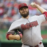 Arizona Diamondbacks starting pitcher Wade Miley deliver during the first inning of a baseball game against the Washington Nationals on Thursday, Aug. 21, 2014, in Washington. (AP Photo/Evan Vucci)