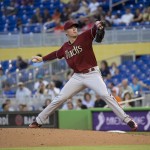 Arizona Diamondbacks starting pitcher Chase Anderson (57) throws to the Miami Marlins during the first inning of a baseball game in Miami, Wednesday, May 20, 2015. (AP Photo/J Pat Carter)