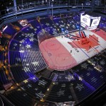 The Canadian flag is projected on the ice at Nationwide Arena as the Canadian national anthem is rehearsed before the NHL All-Star hockey skills competition, Saturday, Jan. 24, 2015 in Columbus, Ohio. (AP Photo/Gene J. Puskar)