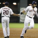 Houston Astros' Jon Singleton (28) is congratulated by third base coach Tarrik Brock after hitting a home run to right field during the third inning of a baseball game against the Arizona Diamondbacks, Thursday, June 12, 2014, in Houston. (AP Photo/Patric Schneider)