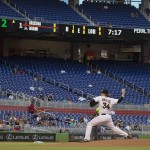 Miami Marlins starting pitcher Tom Koehler throws to an Arizona Diamondbacks batter during the first inning of a baseball game in Miami, Tuesday, May 19, 2015. (AP Photo/J Pat Carter)