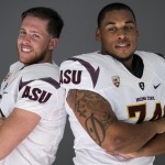 Arizona State quarterback Taylor Kelly, left, and offensive lineman Jamil Douglas pose for a photo at the Pac-12 NCAA college football media days at Paramount Studios in Los Angeles, Thursday, July 24, 2014. (AP Photo)