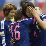 Japan's Mana Iwabuchi (16) and Saki Kumagai (4) console each other after the FIFA Women's World Cup soccer championship final against Japan in Vancouver, British Columbia, Canada, Sunday, July 5, 2015. The United States won 5-2. (Jonathtan Hayward/The Canadian Press via AP)