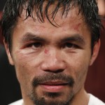 Manny Pacquiao, from the Philippines, waits after the welterweight title fight against Floyd Mayweather Jr., on Saturday, May 2, 2015 in Las Vegas. (AP Photo/John Locher)