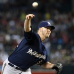 Milwaukee Brewers' Jimmy Nelson throws a pitch against the Arizona Diamondbacks during the first inning of a baseball game Friday, July 24, 2015, in Phoenix. (AP Photo/Ross D. Franklin)