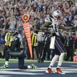 New England Patriots wide receiver Brandon LaFell (19) celebrates after catching an 11-yard touchdown pass in front of Seattle Seahawks free safety Earl Thomas (29) during the first half of NFL Super Bowl XLIX football game Sunday, Feb. 1, 2015, in Glendale, Ariz. (AP Photo/Matt Rourke)
