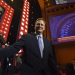NFL commissioner Roger Goodell walks around the Auditorium Theater to meet fans during in the third round of the 2015 NFL Football Draft, Friday, May 1, 2015, in Chicago. (AP Photo/Paul Beaty)