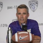 Washington head coach Chris Petersen takes questions at the 2014 Pac-12 NCAA college football media days at Paramount Studios in Los Angeles Thursday, July 24, 2014. (AP Photo)