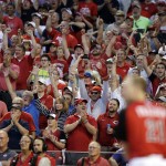 Fans cheer for National League's Todd Frazier, of the Cincinnati Reds, as he hits during the MLB All-Star baseball Home Run Derby, Monday, July 13, 2015, in Cincinnati. (AP Photo/John Minchillo)