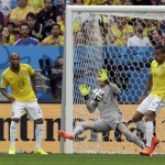 Netherlands' Daley Blind, left, scores his side's second goal during the World Cup third-place soccer match between Brazil and the Netherlands at the Estadio Nacional in Brasilia, Brazil, Saturday, July 12, 2014. (AP Photo/Hassan Ammar)