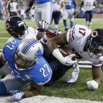 Chicago Bears wide receiver Alshon Jeffery (17) falls into the end zone for a touchdown during the first half of an NFL football game against the Detroit Lions in Detroit, Thursday, Nov. 27, 2014. (AP Photo/Rick Osentoski)