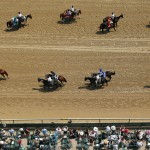 Horses are paraded in a race before the 141st running of the Kentucky Derby horse race at Churchill Downs Saturday, May 2, 2015, in Louisville, Ky. (AP Photo/Charlie Riedel)